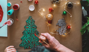 Father Helps Child In Painting Wooden Christmas Tr 2025 01 09 15 35 12 Utc