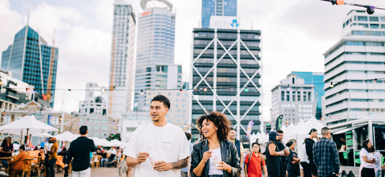 Couple Enjoying Icecream On Auckland Waterfront