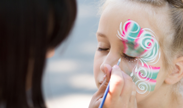 Generic girl getting face painted